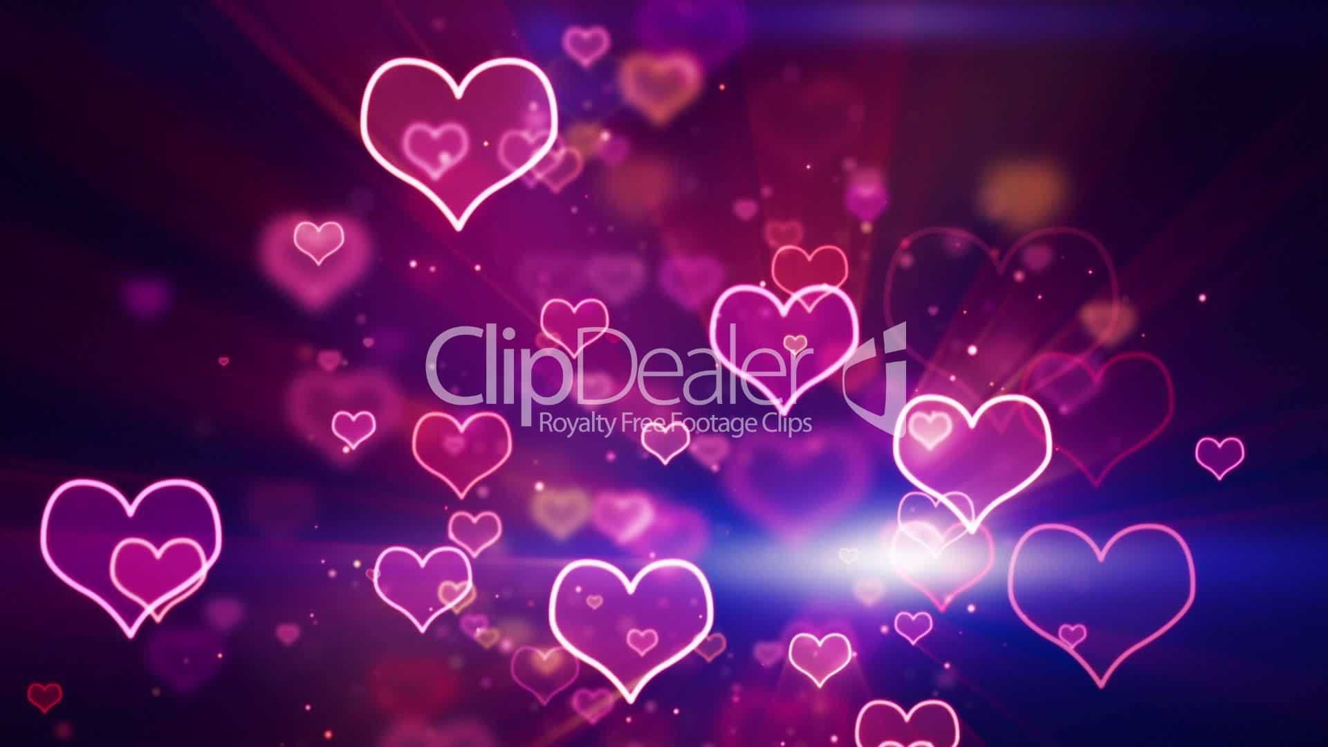 glowing neon hearts seamless loop background: Royalty-free video and